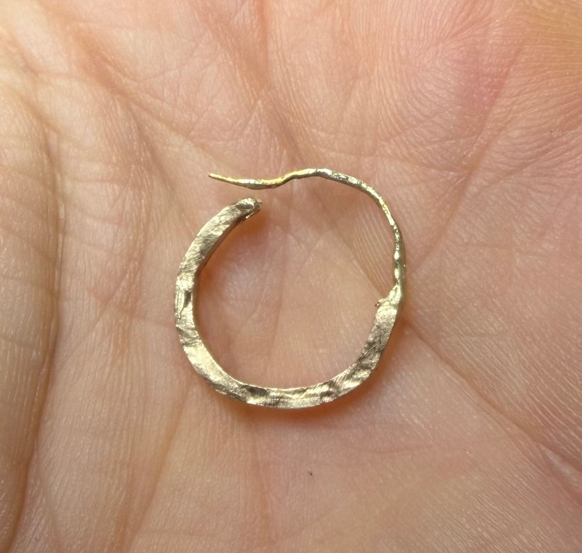 Custom 14k hammered huggie hoops, with Black Diamond Accents