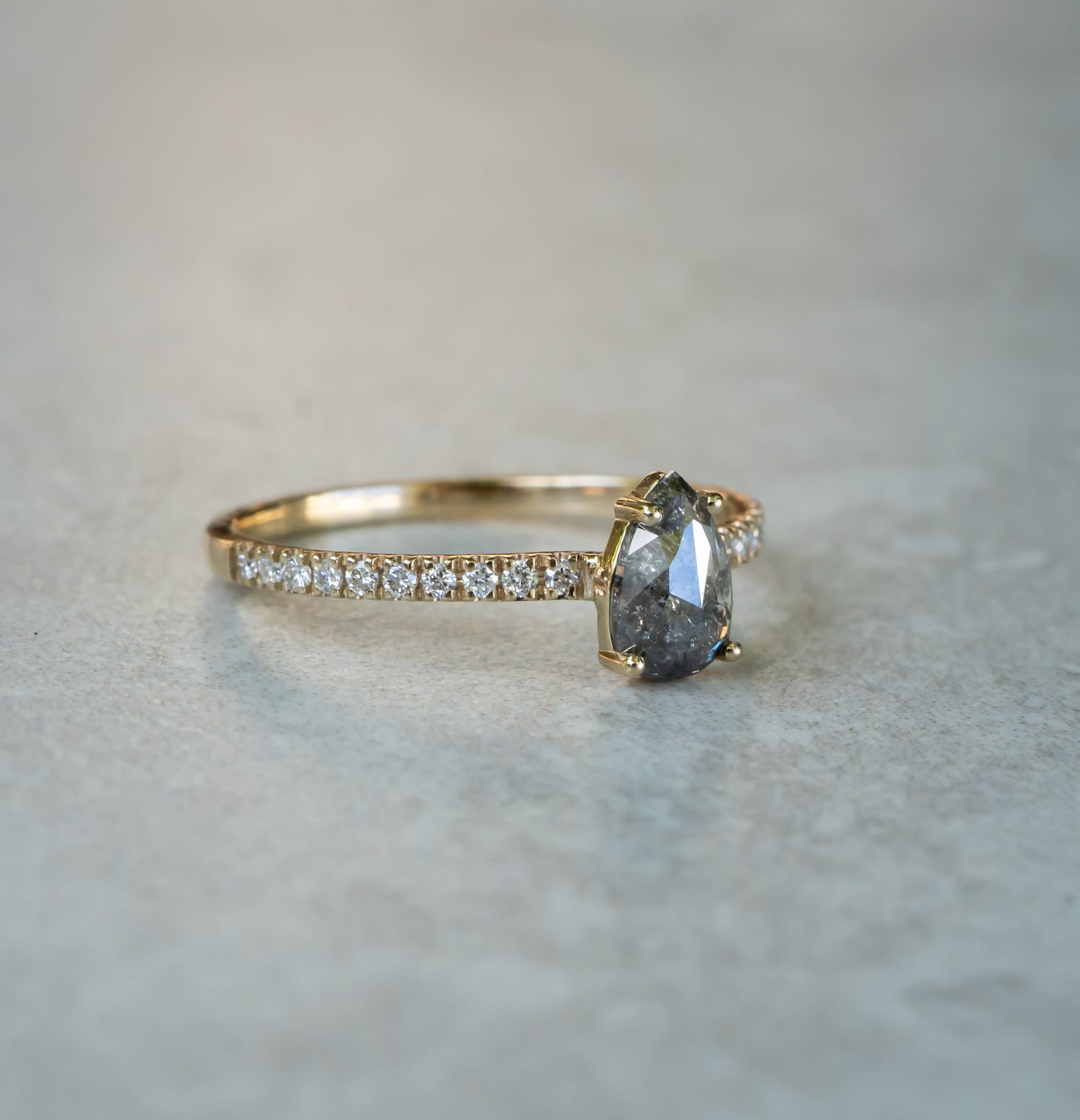 0.63 Carat Salt and Pepper Pear Diamond Ring with Pavé Band
