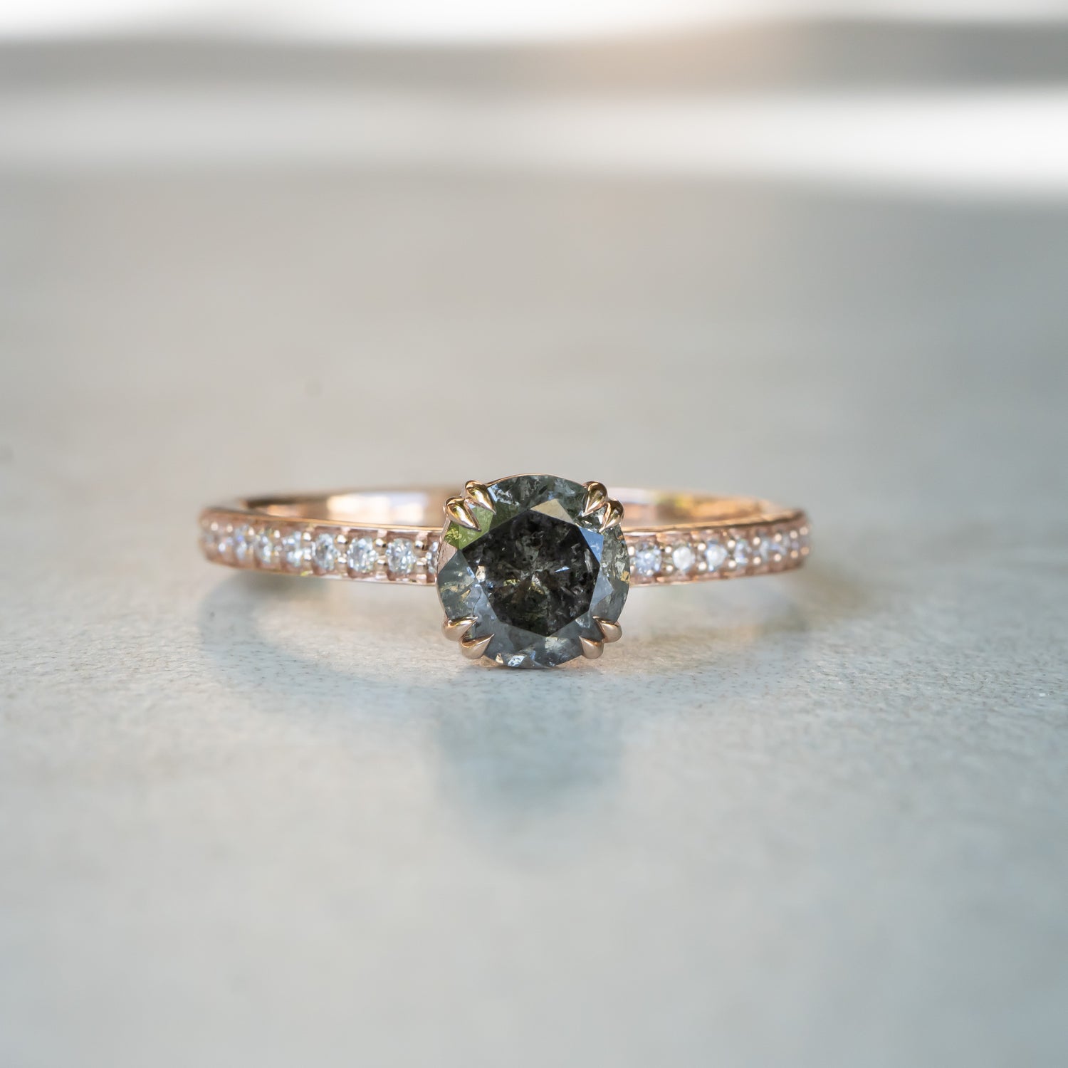 Brilliant Cut Salt And Pepper Diamond Ring. 14k Rose Gold, Pavé Diamond Band