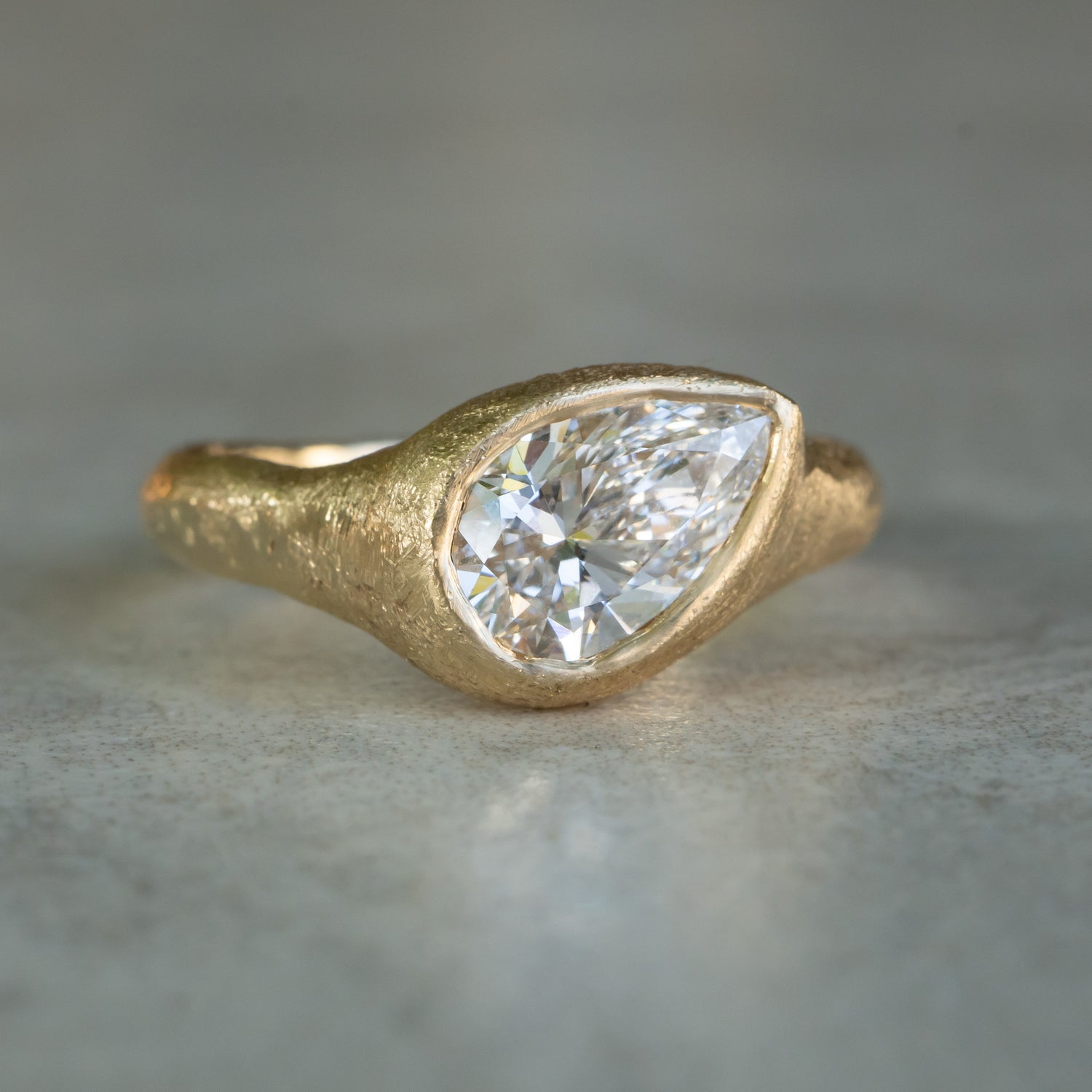 Slanted Pear, Signent Style Diamond Engagement Ring
