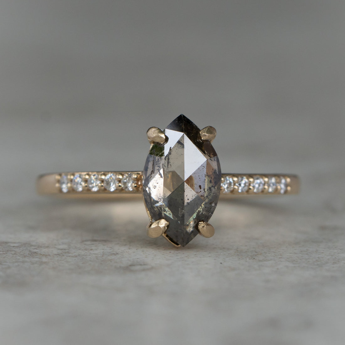 Salt and pepper diamond engagement ring. Marquis cut 