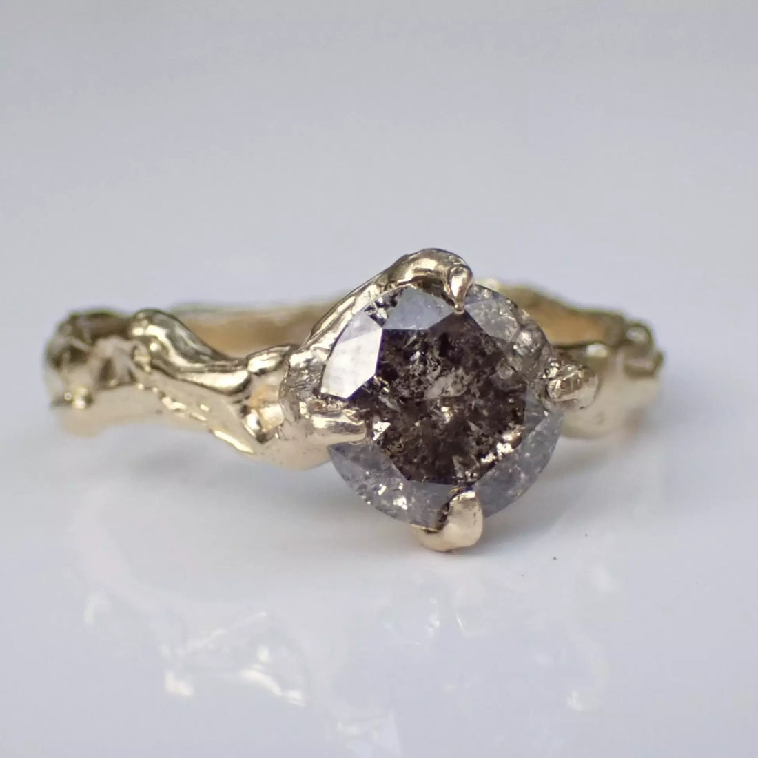 Molten melted gold diamond ring salt and pepper diamond