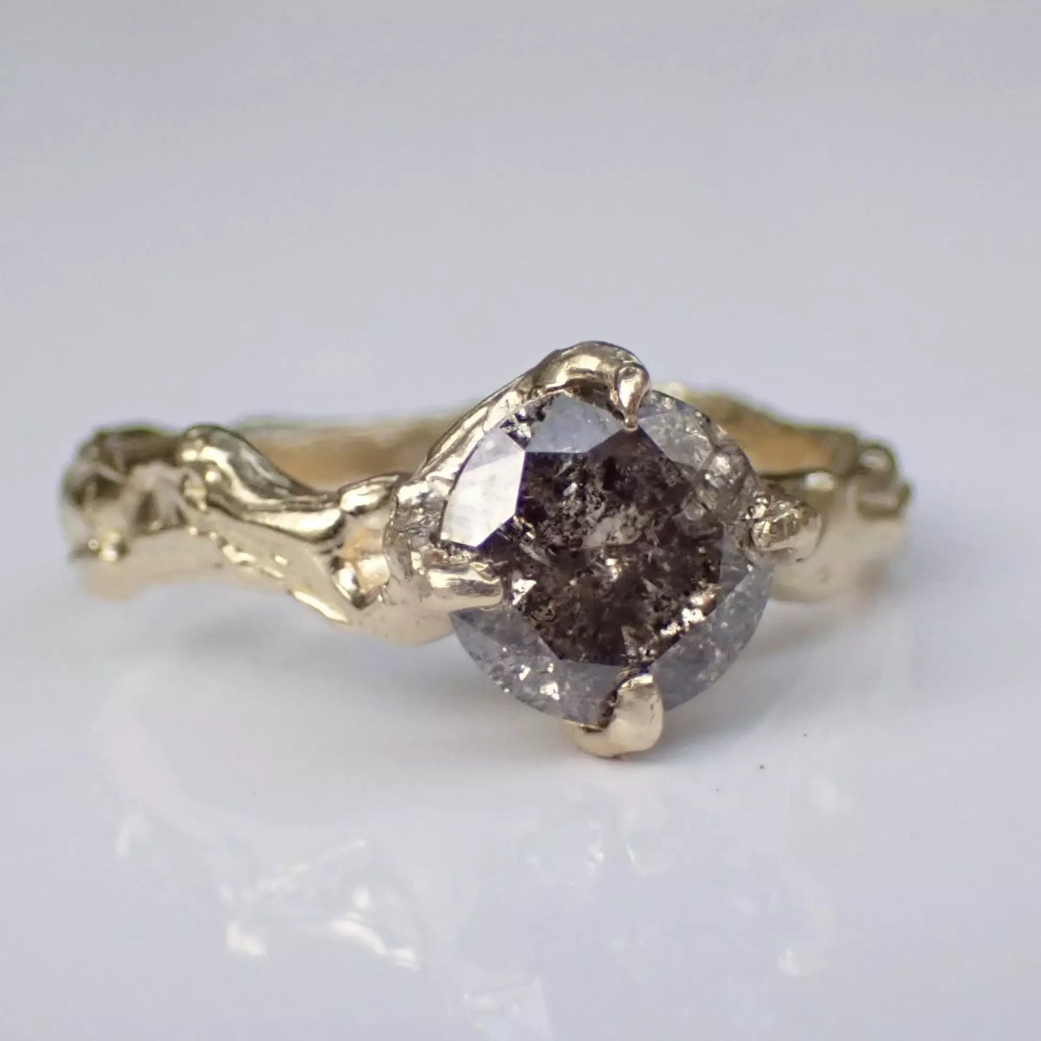 Molten melted gold diamond ring salt and pepper diamond