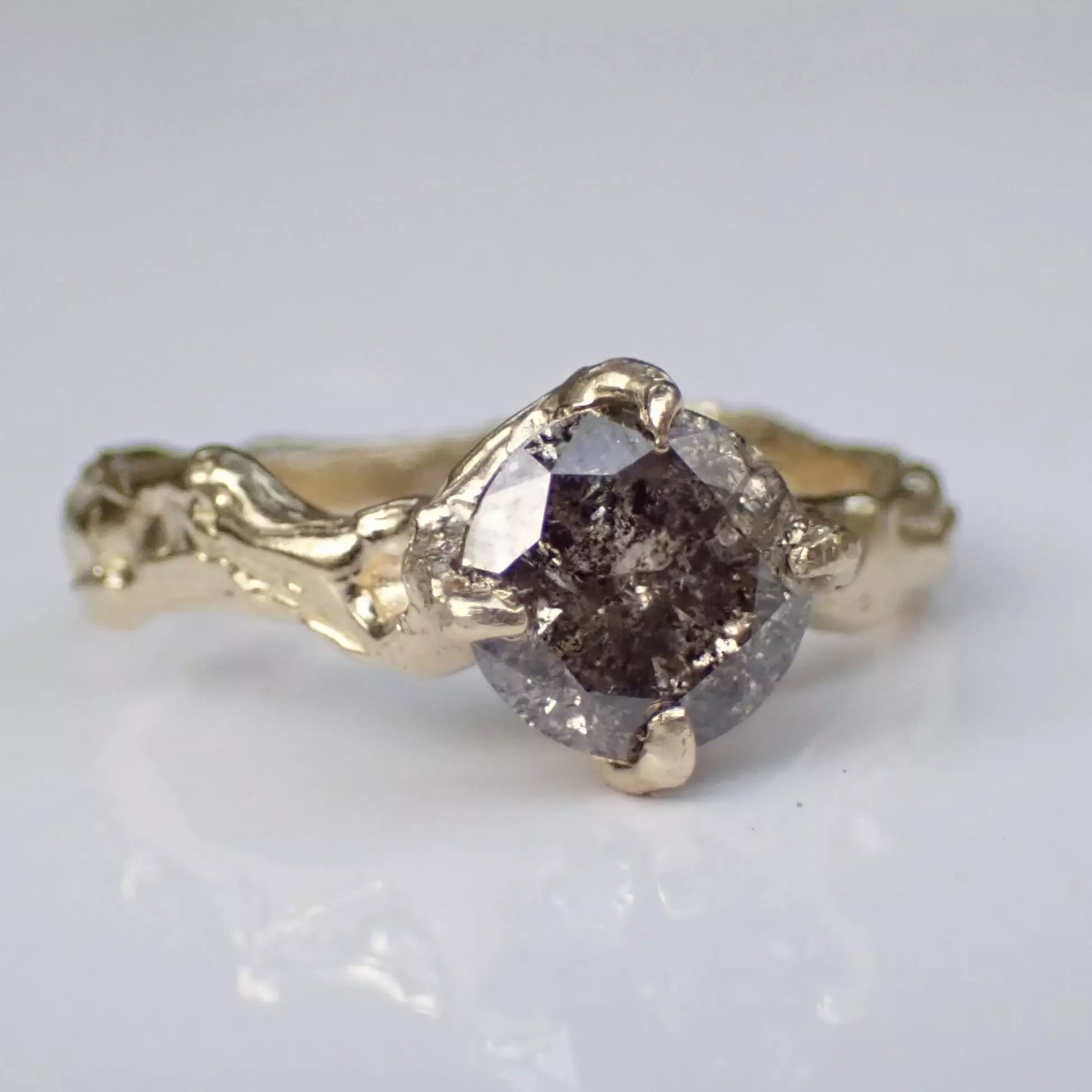 Molten melted gold diamond ring salt and pepper diamond