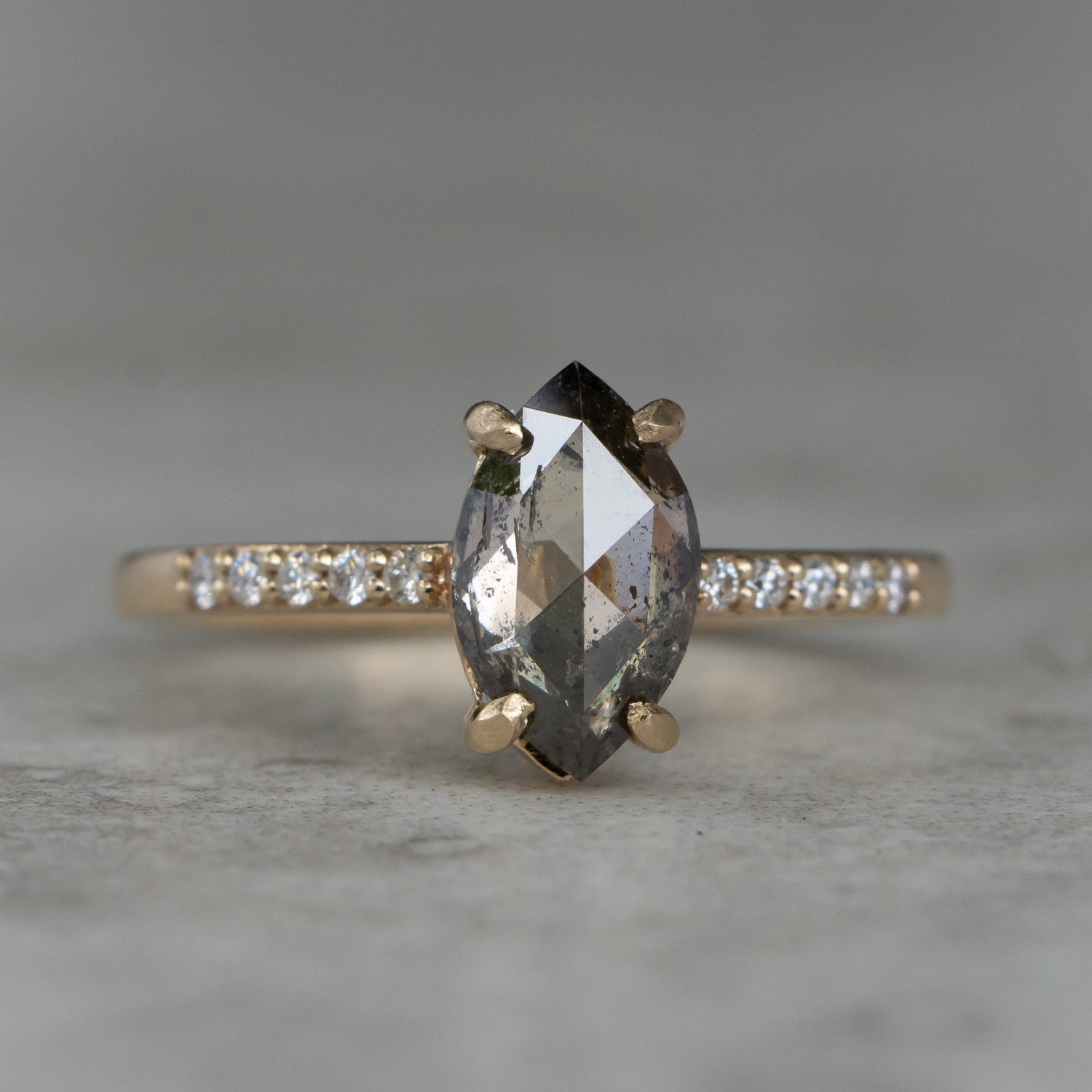 SAlt and pepper engagement ring. Marquis cut 