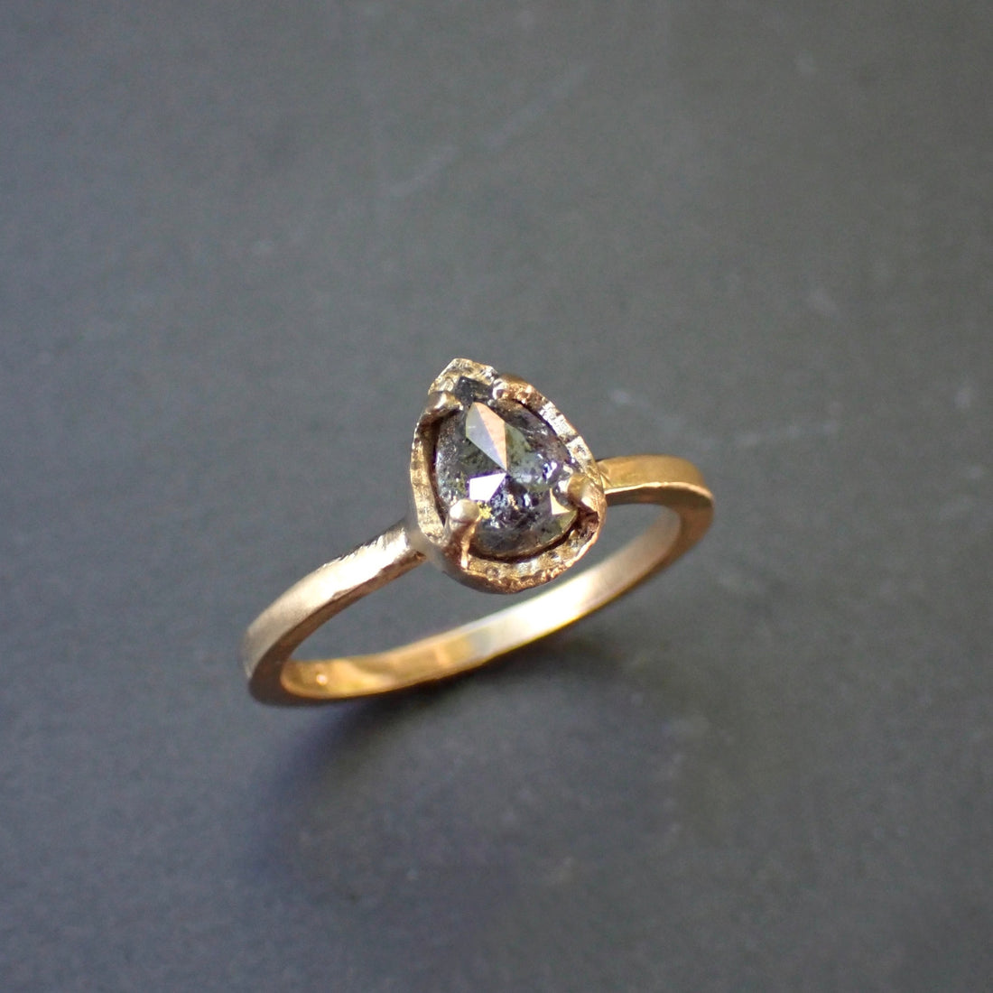 Salt and pepper diamond ring, pear cut